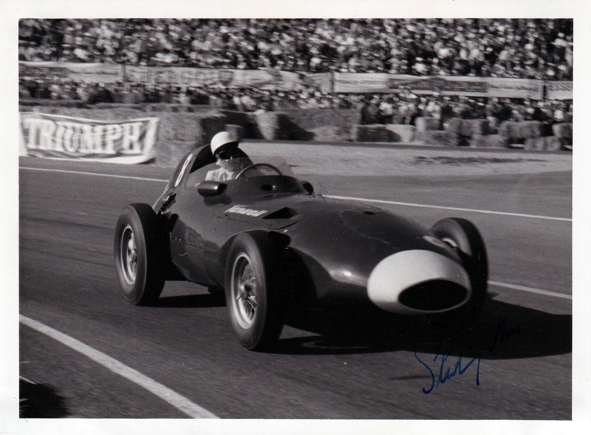 Stirling Moss signed vintage Autosport press photograph driving a Vanwall VW5