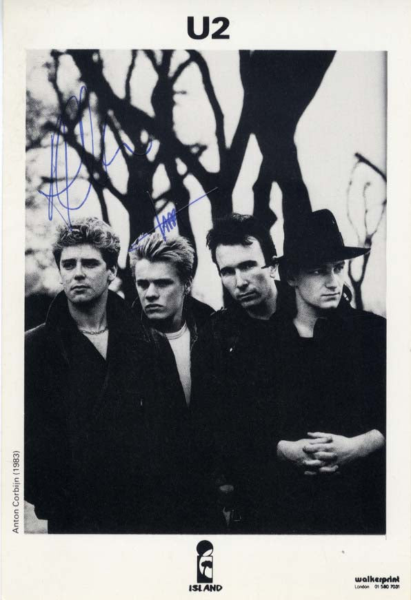 U2 (band) autographs, two signed photographs